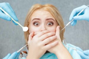 dental anxiety treatment, teeth appointment delays, manage dental fear, dental phobia solutions, anxiety free dentistry, fear of dental treatment, dental anxiety causes, long-term dental neglect, sedation dentistry options, dental treatment procrastination